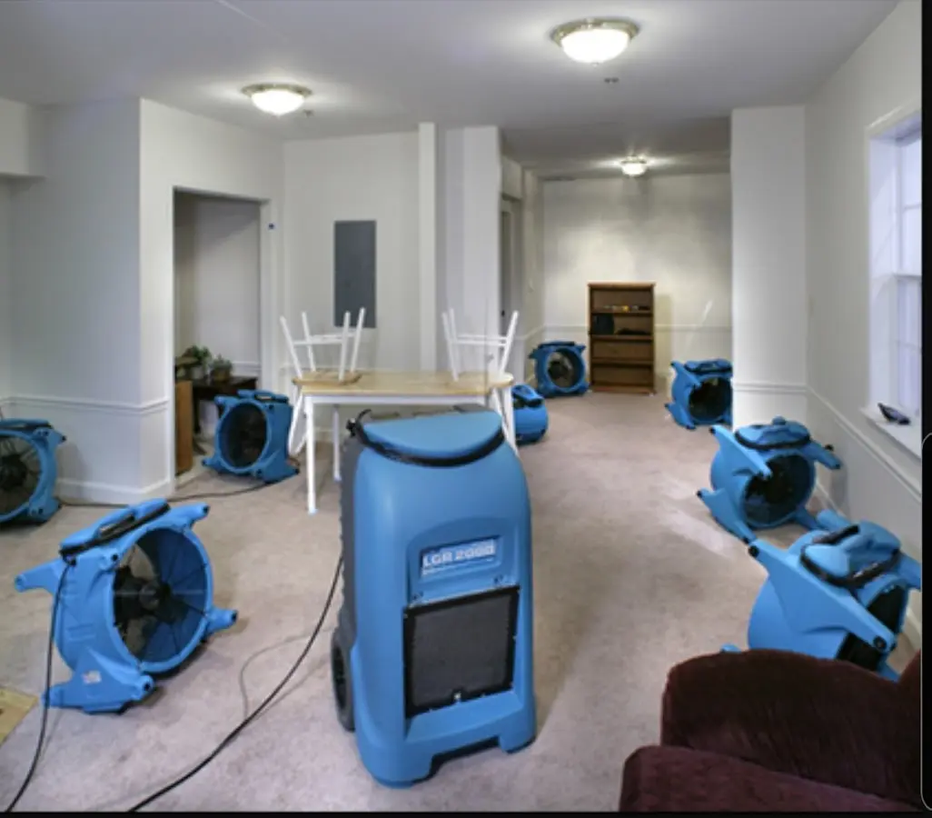 Air movers and dehumidifier setup for Water Damage Restoration in Keller